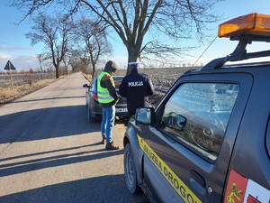 policjant podczas pracy komisji