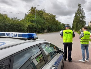 policjant podczas pracy komisji